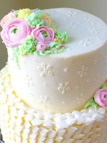 Buttercream Eyelet Cake Video Tutorial by MyCakeSchool.com! Member cake video section. Featuring buttercream eyelet and flowers!