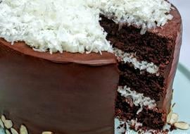 Decadent Almond Joy Cake Recipe by My Cake School! Rich chocolate cake layers with coconut filling, ganache, and almonds! My Cake School.