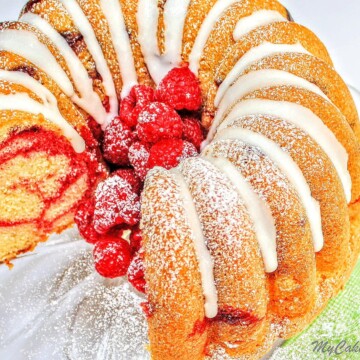 Moist and flavorful Lemon Raspberry Swirl Pound Cake Recipe by MyCakeSchool.com!