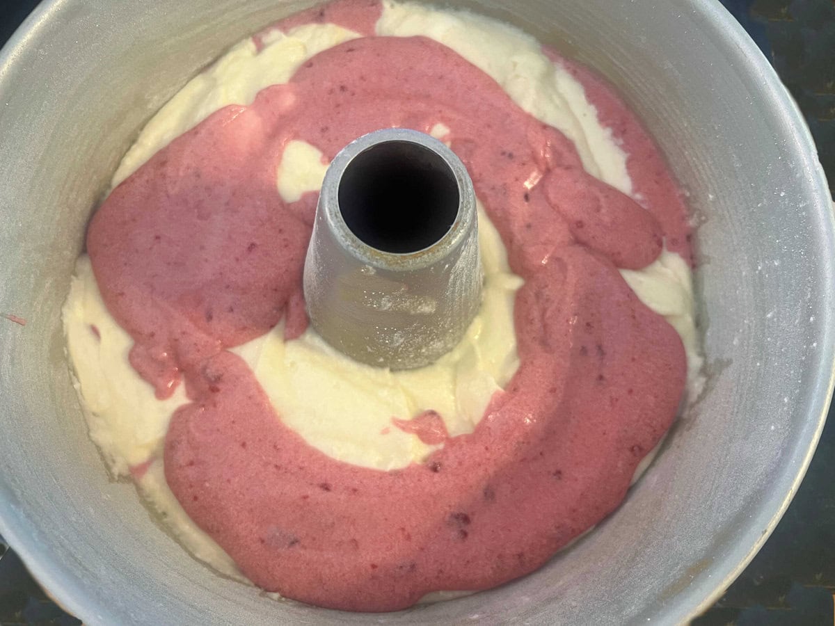 Layering the batter for the Lemon Raspberry Pound Cake.