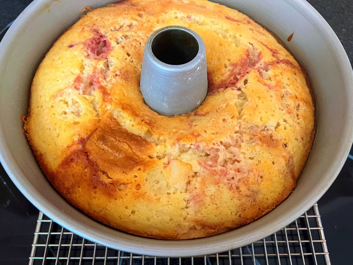 Lemon Raspberry Pound Cake, cooling on a wire rack in the pan.