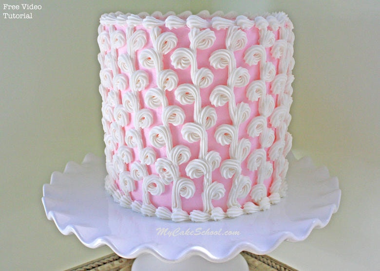 This elegant cake design features loops of buttercream piping! Learn the simple, impressive method in MyCakeSchool.com's free cake video tutorial!