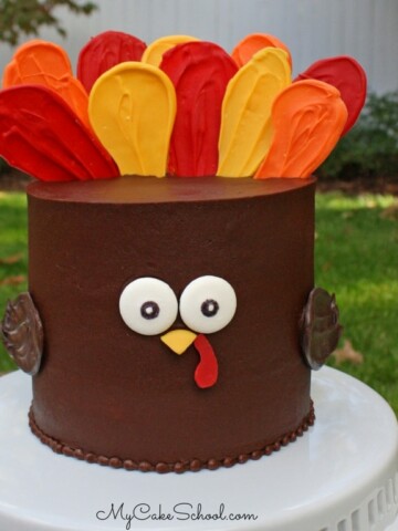 Cute and Easy Turkey Cake! Free Video Tutorial by MyCakeSchool.com. This would be perfect for Thanksgiving gatherings!