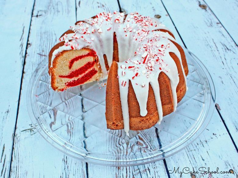 This Red Velvet Marble Cake is the BEST! It has amazing flavor and we love it with an easy and delicious peppermint glaze for the holidays! Moist and Delicious Red Velvet Marble Pound Cake with Peppermint Glaze
