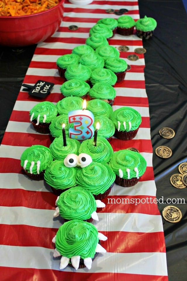 Adorable Crocodile Cupcake Cake Tutorial by MomSpotted as featured in MyCakeSchool.com's roundup of cupcake cakes!