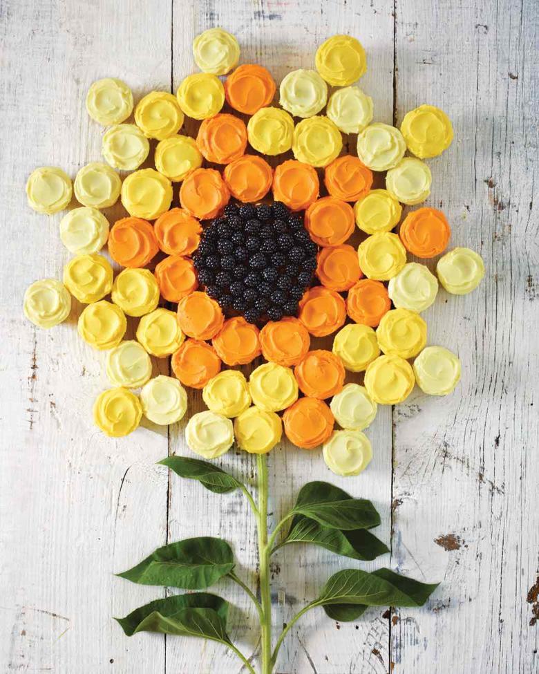 Beautiful Sunflower Cupcake Cake by Martha Stewart as featured in MyCakeSchool.com's Roundup of Favorite Cupcake Cakes!