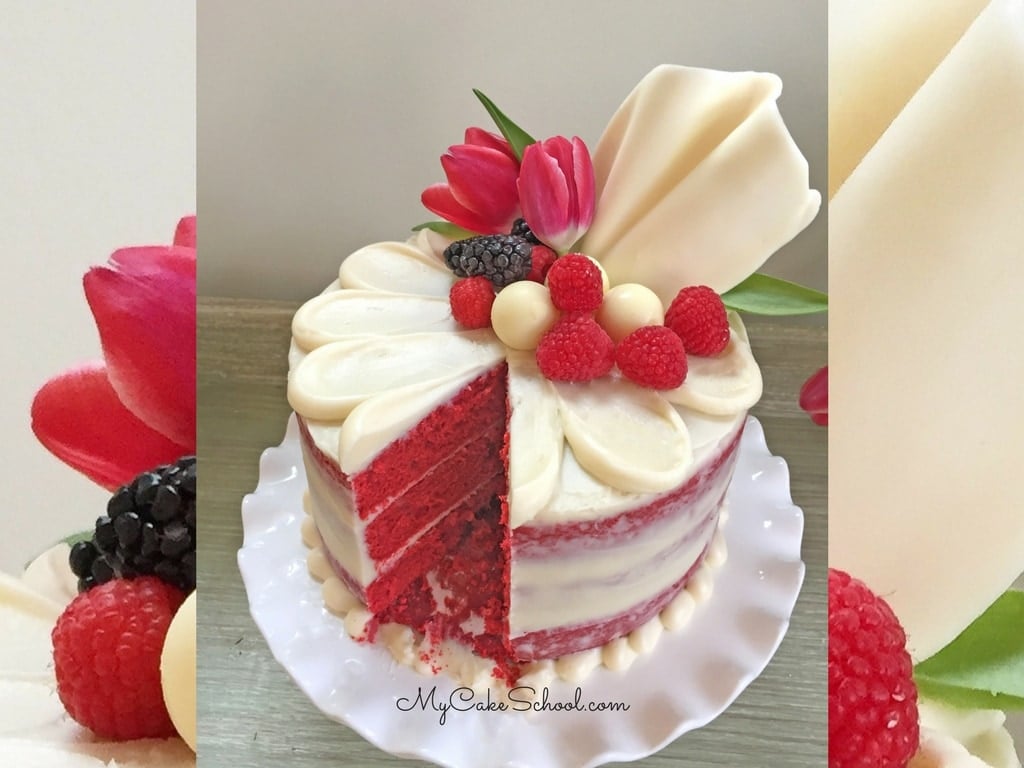  Red Velvet Semi-Naked Cake on a pedestal, topped with a chocolate sail, berries, and tulips!