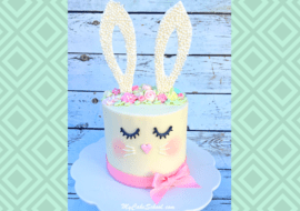 Learn to make a cute and easy bunny cake for Easter, young birthdays or baby showers in this free cake video tutorial!