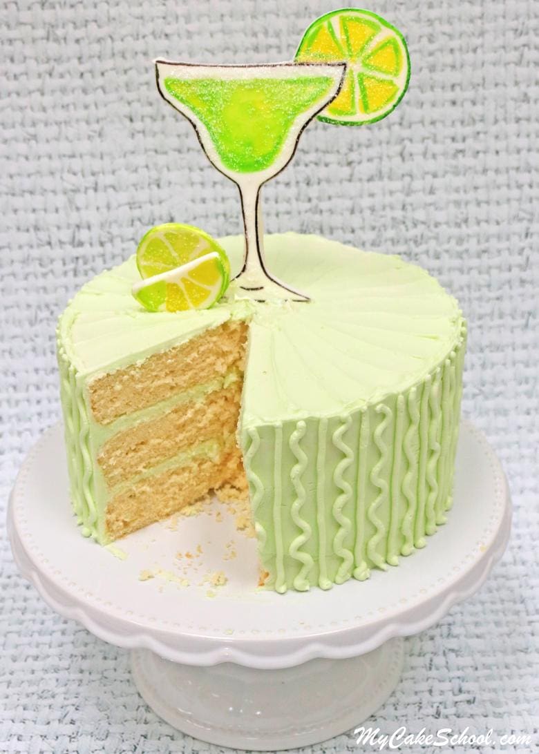 Moist and Delicious Margarita Cake- A Doctored Cake Mix recipe! You'll LOVE this flavorful lemon and lime cake frosted in Tequila Lime Buttercream! Perfect for Cinco de Mayo and summertime entertaining!