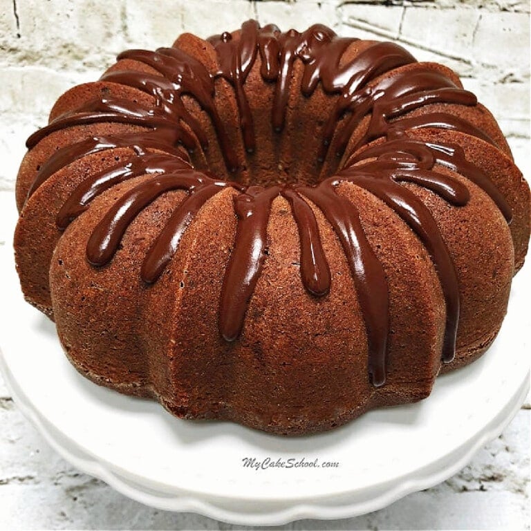 Double Chocolate Pound Cake on a pedestal.