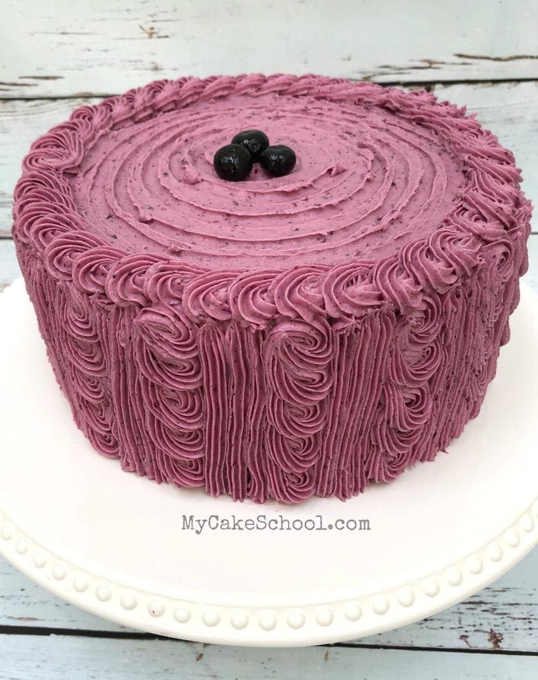 Lemon Blueberry Cake with Lemon Cream Cheese Filling and Blueberry Buttercream Frosting!