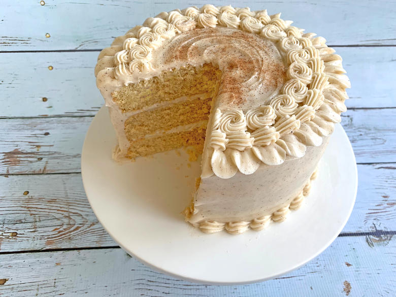 The BEST Eggnog Cake with Eggnog Cream Cheese Frosting- This is a doctored cake mix recipe.