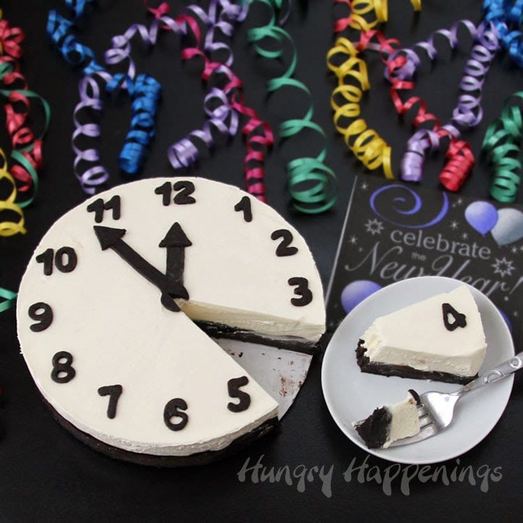 New Year's Eve Clock Cheesecake by Hungry Happenings as featured on My Cake School's roundup of New Year's Eve cake ideas!