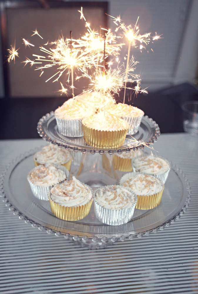 New Year's Eve Cupcakes with Sparklers! Featured on Catch my Party as well as MyCakeSchool.com's roundup of favorite New Year's dessert ideas!