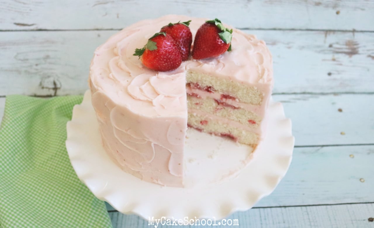 This Champagne and Strawberries Cake by MyCakeSchool.com is SO moist and delicious- it is the perfect special occasion cake!