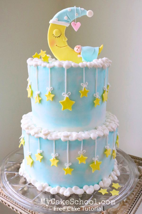 Baby and Moon Cake on a pedestal. Crescent moon cake topper with sleeping baby.