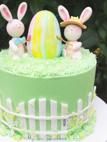 Adorable Bunnies with Easter Egg! A cute Easter Cake tutorial by MyCakeSchool.com (member section)