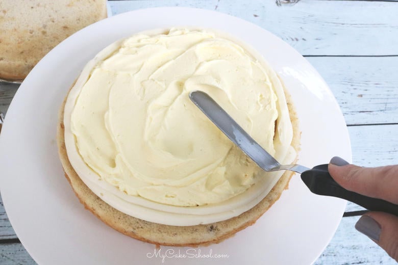 Banana Pudding Cake Recipe from Scratch with vanilla pudding cream filling, bananas, vanilla wafers, cream cheese frosting and whipped cream! 