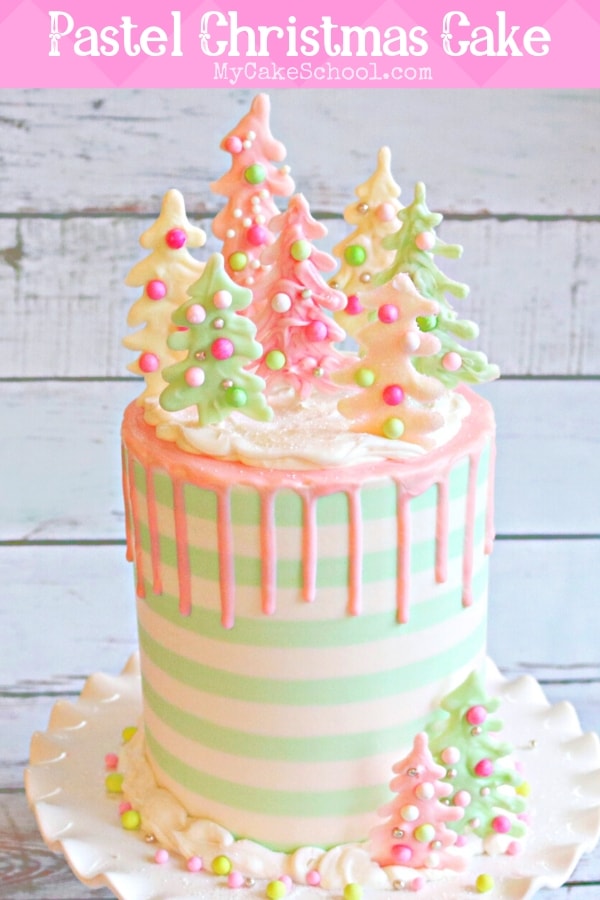 This pastel Christmas Cake was so much fun to make! We love the striped buttercream, pink drip, and colorful chocolate trees!