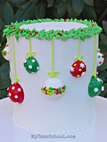 Ornament Cake on a cake pedestal.