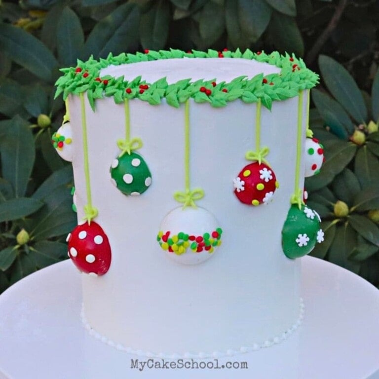 Ornament Cake on a cake pedestal.