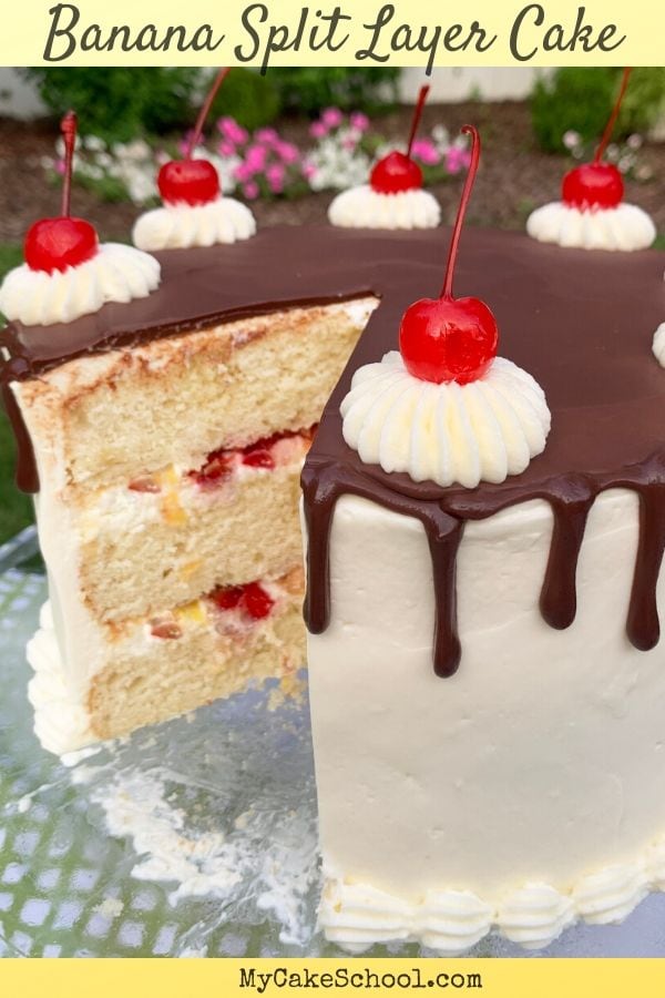 This Banana Split Layer Cake Recipe is the best! Banana Cake Layers are filled with strawberries, pineapple, whipped cream cheese frosting & chocolate. So good!