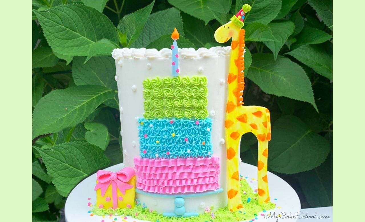 Sweet Giraffe with a Birthday Cake- Free Cake Video - My Cake School