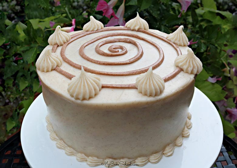 Cinnamon Bun Layer Cake, filled and frosted with Cinnamon Cream Cheese Frosting!