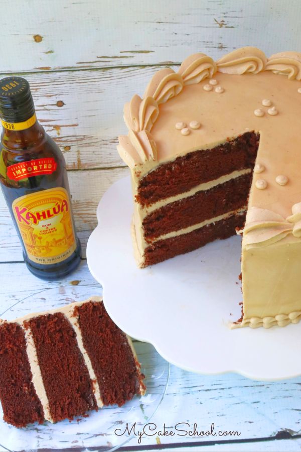 Kahlua Cake, sliced, on a pedestal.