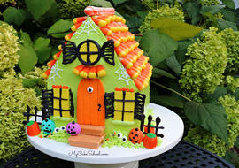 This candy Haunted House Cake is so much fun for Halloween parties!