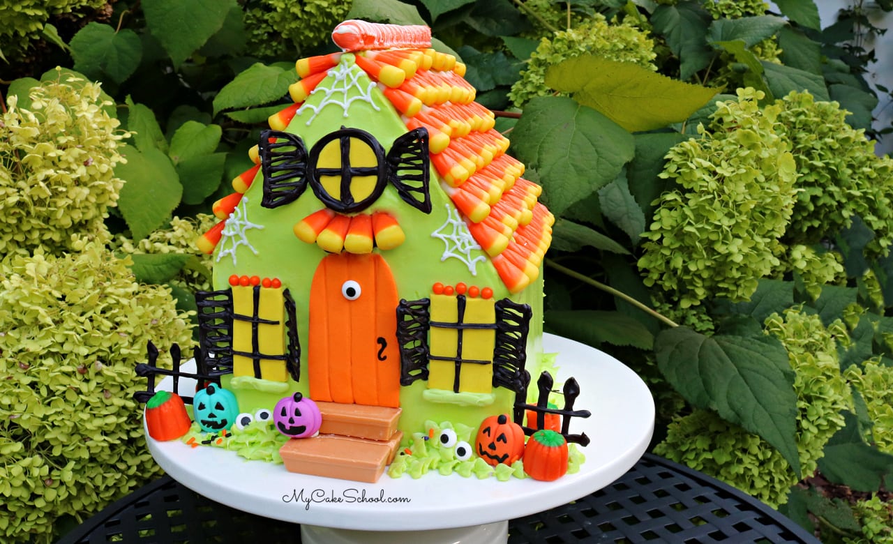 This candy Haunted House Cake is so much fun for Halloween parties!
