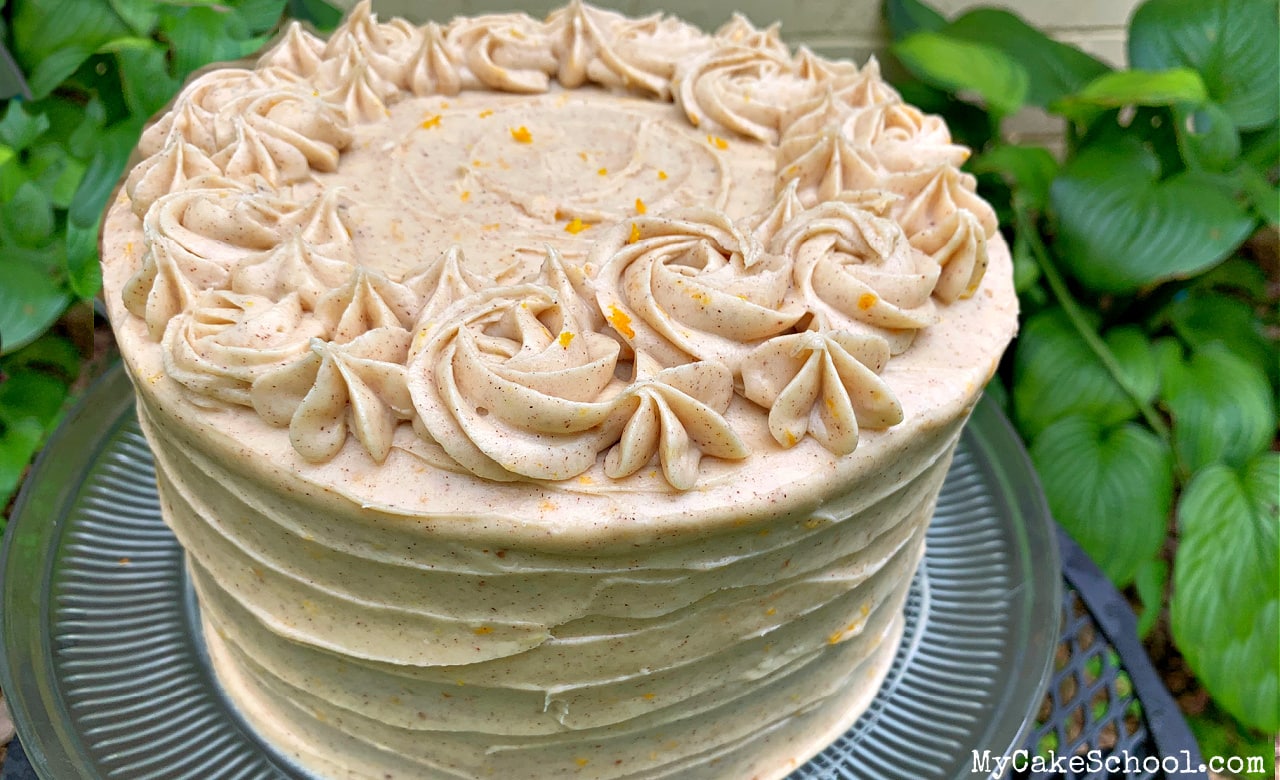 Orange Spice Layer Cake- This Doctored Cake recipe has so much flavor! It is the perfect fall cake!