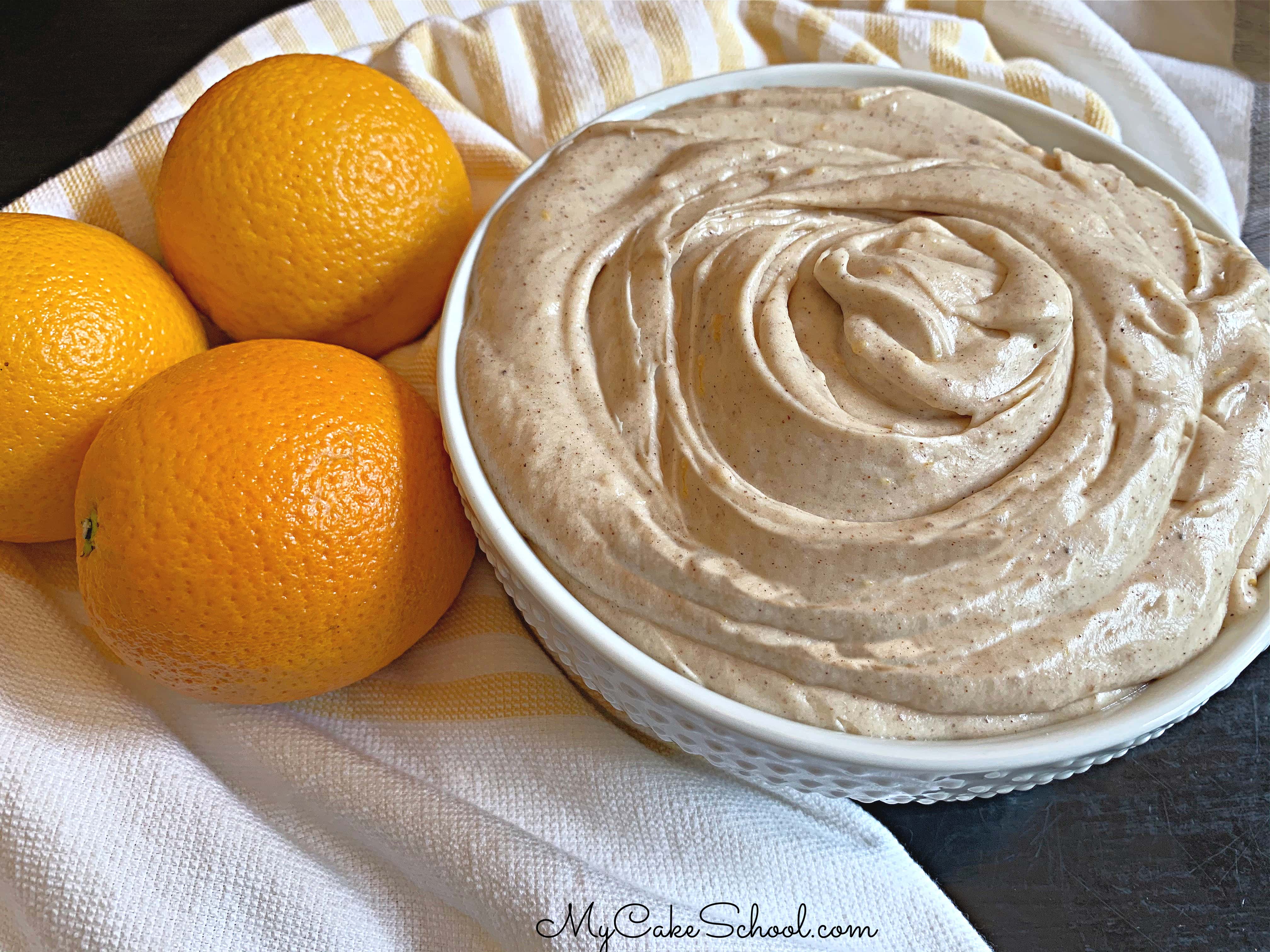 This Orange Spice Cream Cheese Frosting recipe is perfect for fall spice cakes! It is so easy to make, and so delicious!