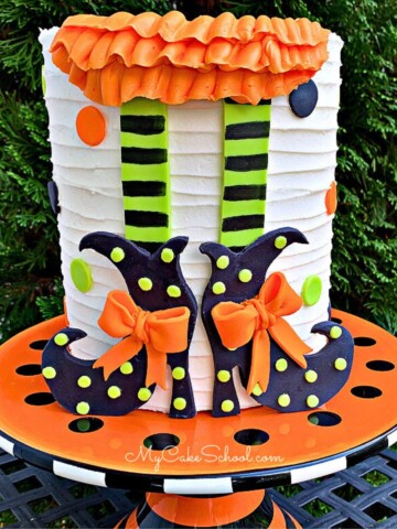 Witch Shoes Cake- black shoes, striped legs, ruffled buttercream skirt on the front of cake.