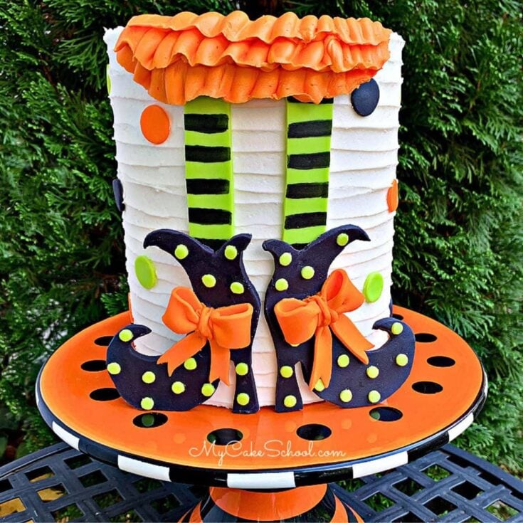 Witch Shoes Cake- black shoes, striped legs, ruffled buttercream skirt on the front of cake.