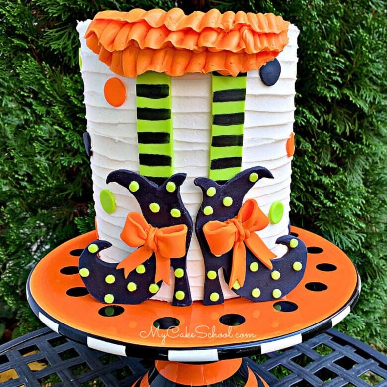 Witch Shoes Cake- black shoes, striped legs, ruffled buttercream skirt on the front of cake.