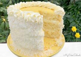 Lemon Coconut Cake with Lemon Curd Filling and Whipped Coconut Cream Cheese Frosting