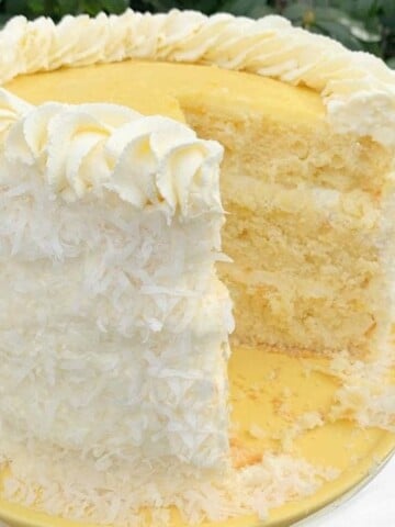 Lemon Coconut Cake with Lemon Curd Filling and Whipped Coconut Cream Cheese Frosting