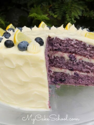 Sliced Blueberry Cake on a cake plate.