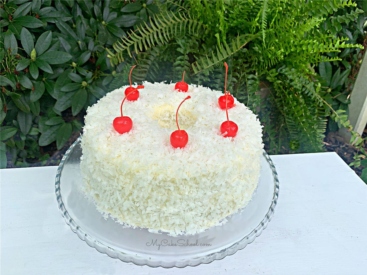 The BEST Cherry Pound Cake with Coconut Frosting