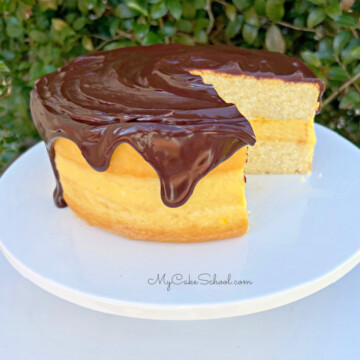 Boston Cream Pie on White Pedestal