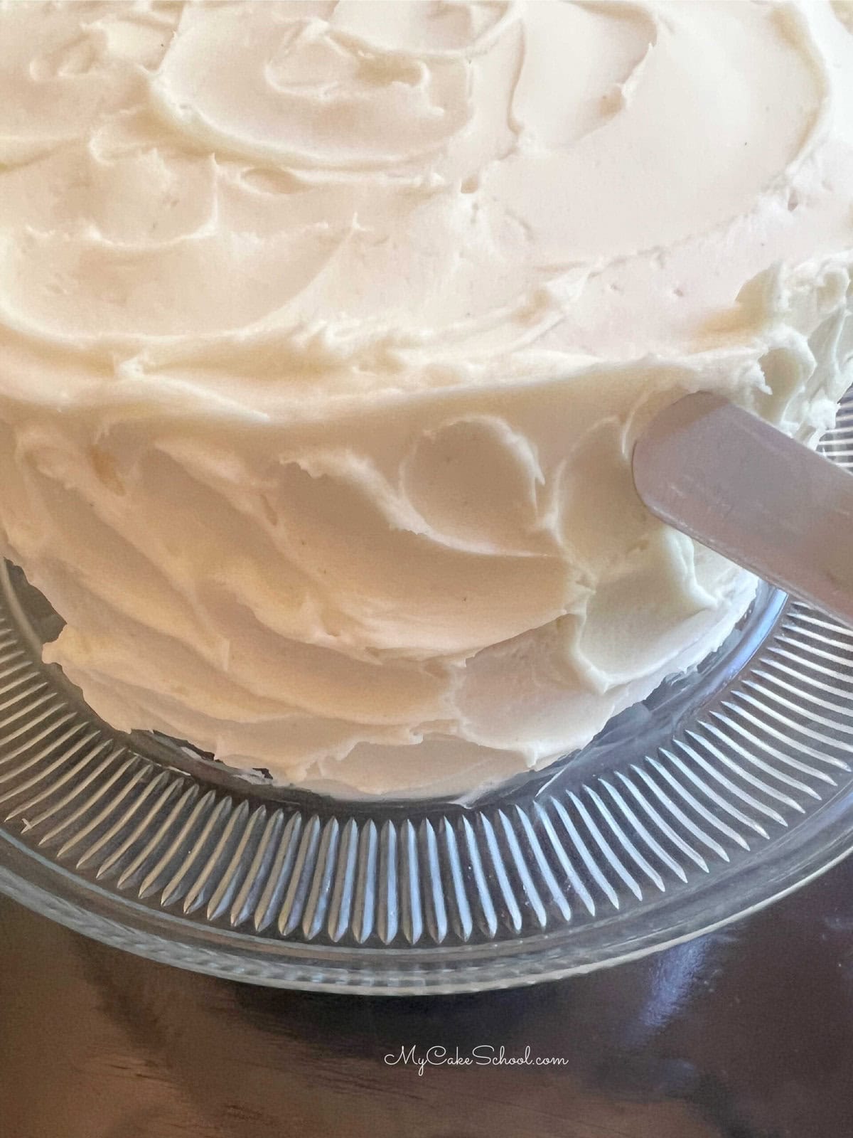 Texturing the frosting on the Orange Vanilla Bean Cake.