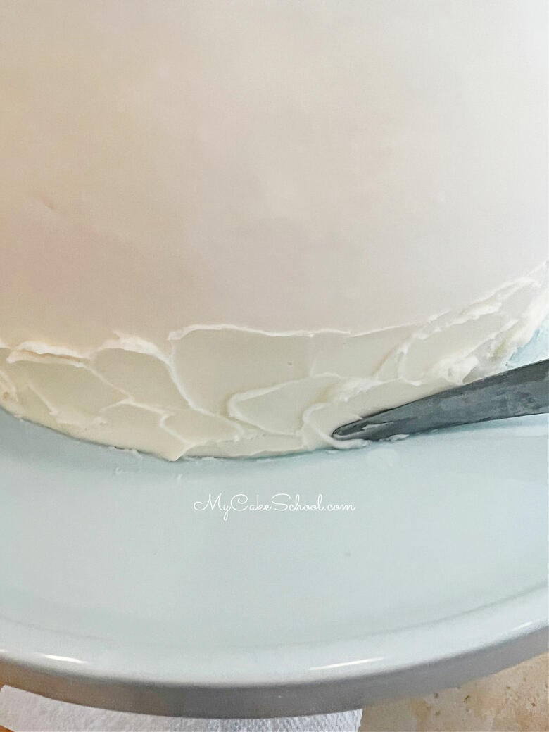 Frosting the Vanilla Velvet Cake