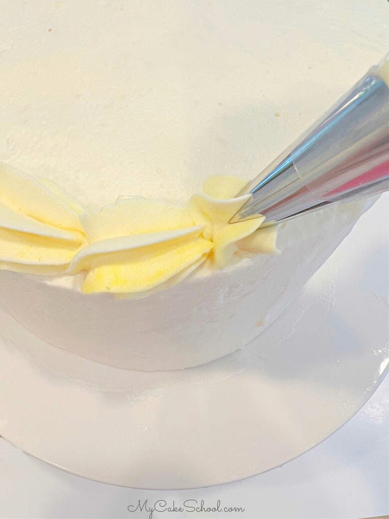 Decorating the Limoncello Cake