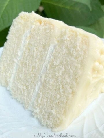 Slice of White Velvet Cake on a plate.
