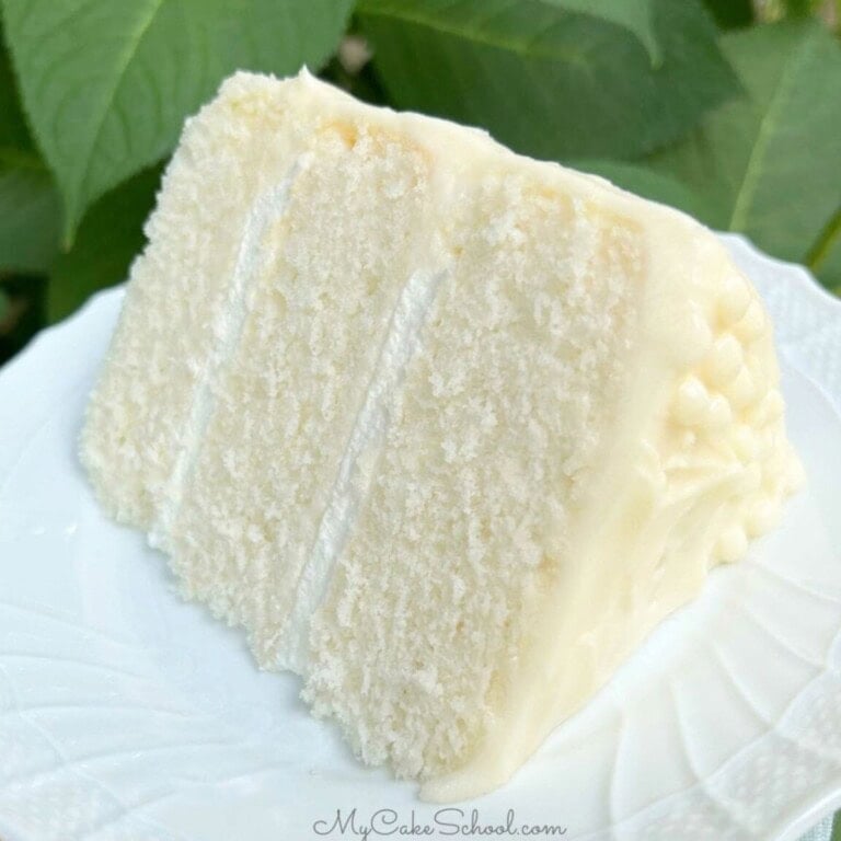 Slice of White Velvet Cake on a plate.