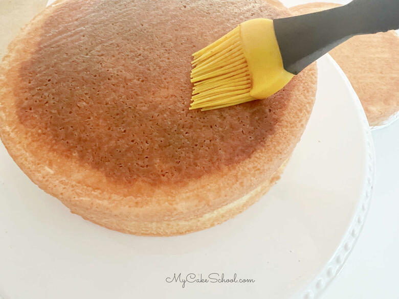 Brushing Espresso onto White Chocolate Cake Layers