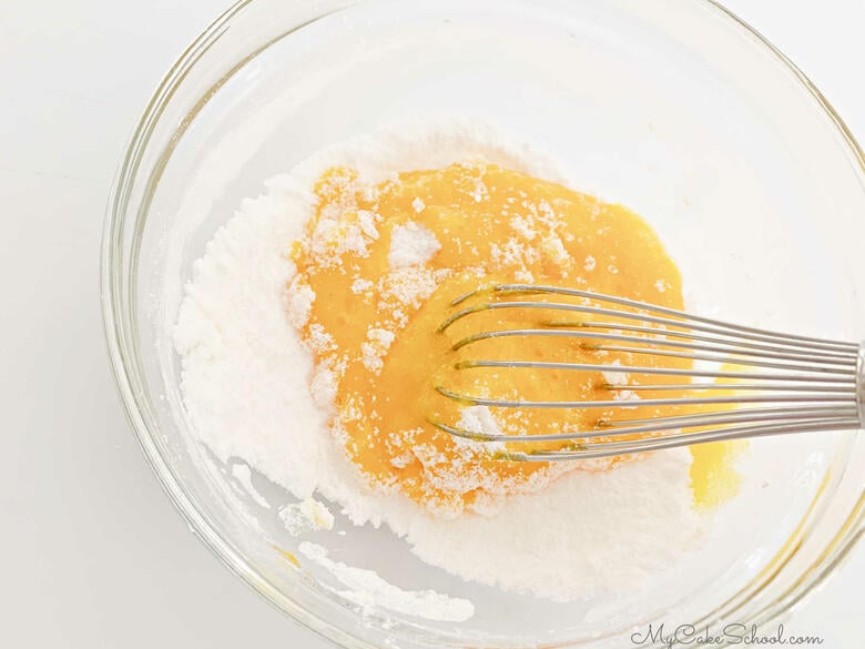 Combining sugar, cornstarch egg yolk