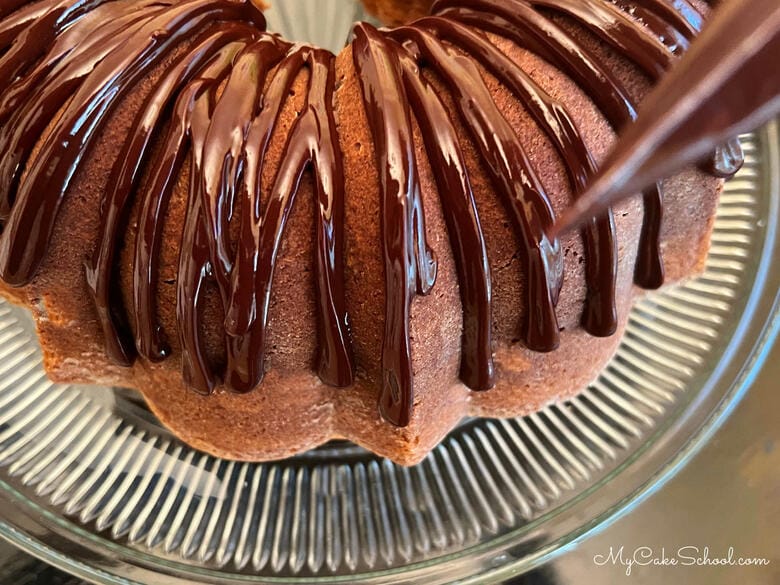 Applying the easy chocolate drip to pound cake