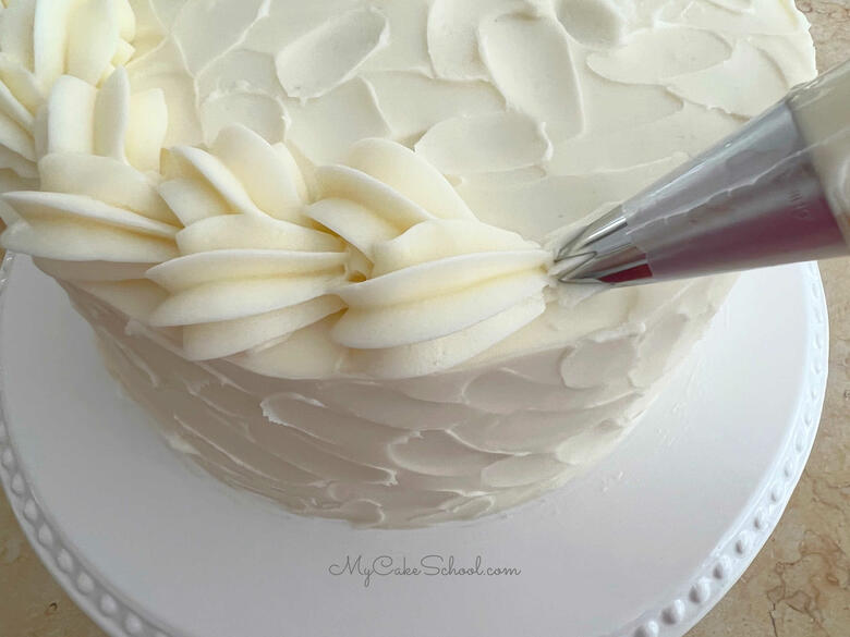 Piping a Braided Border of Frosting